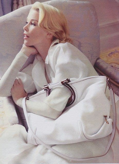 Claudia Schiffer purses